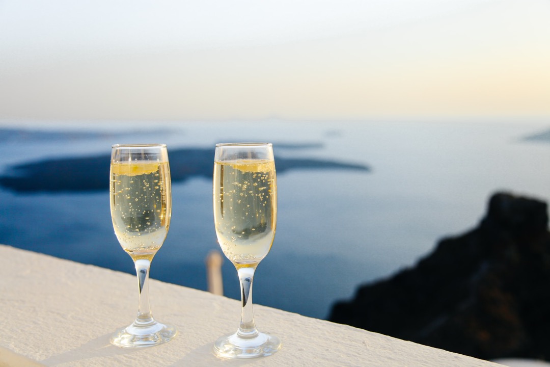 Two champagne glasses for the perception of luxury